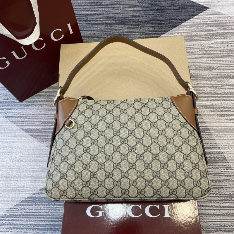 G*u*i top handle bags